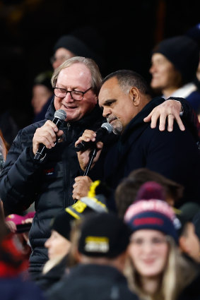 Kevin Sheedy joins Michael Long for the half-time performance.