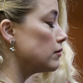 Amber Heard waits for the verdict to be read.