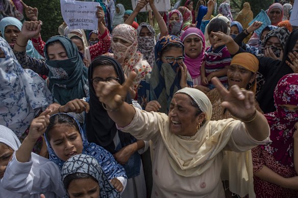 Kashmir Muslim women protesters shout anti Indian slogans during a protest against Indian rule and the revocation of Kashmir's special status, in Srinagar, the summer capital of Indian administered Kashmir, India. 