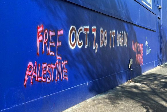 Graffiti painted on the wall of the Officeworks in Fitzroy.