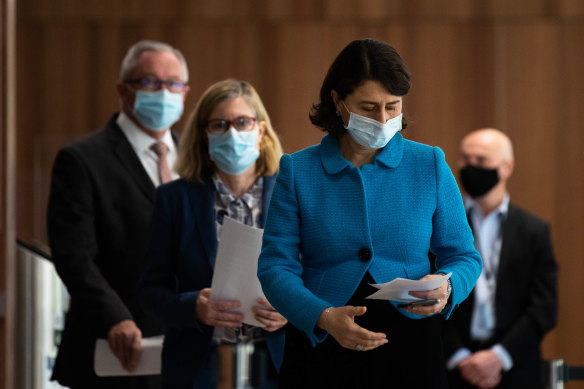 NSW Premier Gladys Berejiklian on Thursday, with Chief Health Officer Dr Kerry Chant and Health Minister Brad Hazzard following behind her.