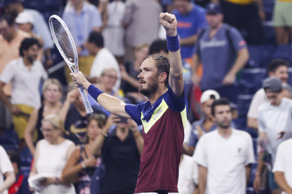 Medvedev celebrates his four-set win over de Minaur.