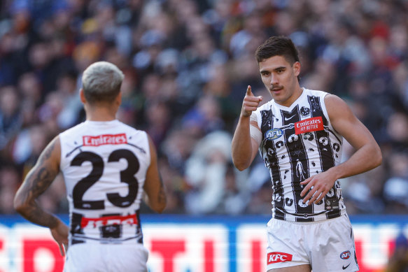 Reef McInnes celebrates a goal for the Magpies this year.