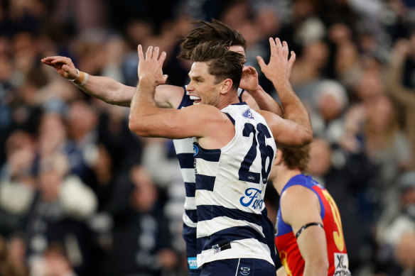 Tom Hawkins celebrates a goal
