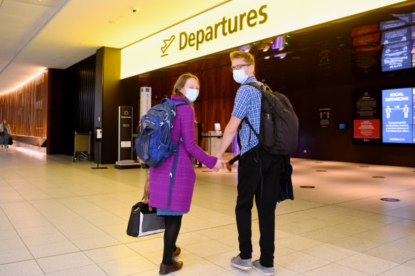 Abigail McKinstry and fiance Jack Drummond prepare to depart Melbourne to fly back to New Zealand to get married after a long wait for flights to resume.