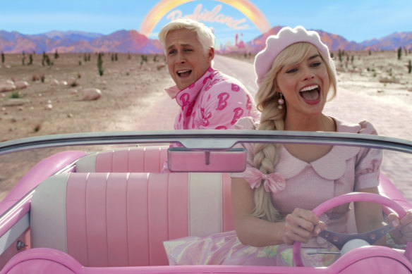 Ryan Gosling (left) and Margot Robbie in a scene from Barbie.
