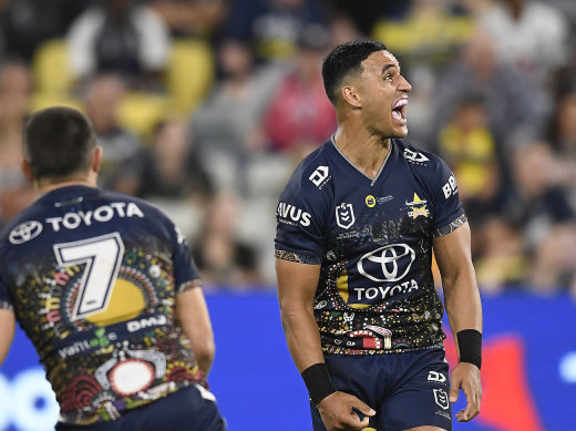 Valentine Holmes celebrates his match-winning play for the Cowboys.