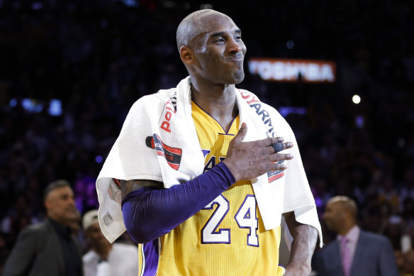 Kobe Bryant speaks to fans in LA after his final NBA game.