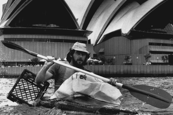 Ken Evans from Paddlers for Peace with a canoe of rubbish.