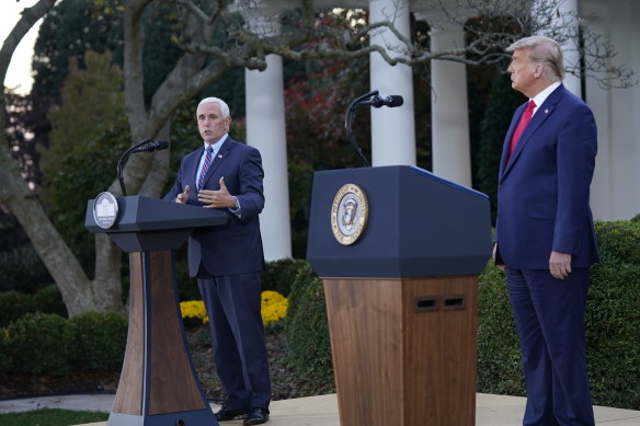 US Vice-President Mike Pence thanks President Donald Trump for his leadership on the COVID vaccine effort, during a press conference on Operation Warp Speed at the White House on Saturday (AEDT).