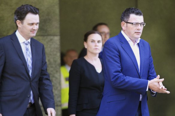 Jane Garrett (rear) with Daniel Andrews in 2015 when she was a minister.