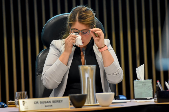 Then-mayor Susan Serey wipes away tears at Casey Council’s last meeting   after the council was sacked in 2020.