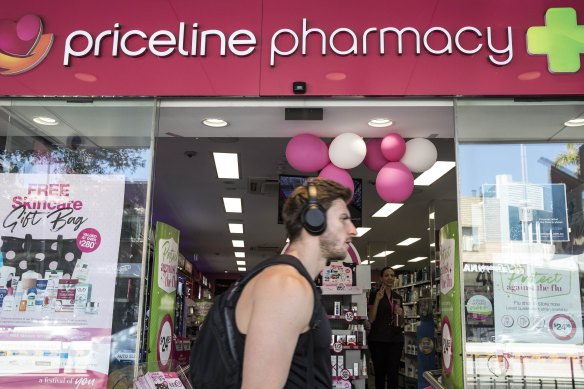 API, which owns Priceline pharmacies, watches while its suitors slug it out.