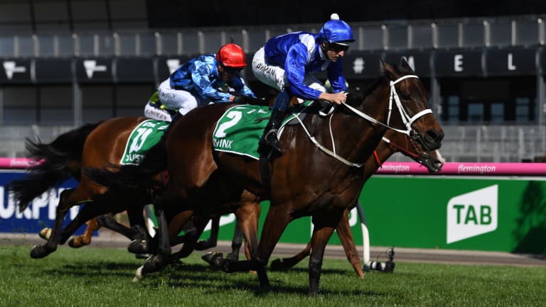 Full Flight: Hugh Bowman hits the front on Winx in the Turnbull Stakes at Flemington on Saturday.