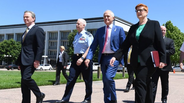 Defence Industry Minister Christopher Pyne, Mr Turnbull and Defence Minister Marise Payne.