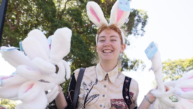 Sinead Connon has bought Easter eggs and 17 pairs of bunny ears for her friends who are going to a music festival over the Easter Weekend. She shops in different stores looking for specials to counter the rising prices in Sydney.