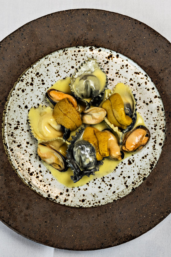 Cheese ravioli with sea urchin, mussels and yuzu butter.