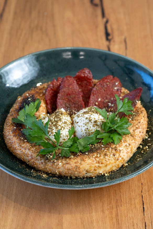 Eggs with kolouri and sujuk, a style of beef sausage.