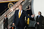 Donald Trump speaks while switching planes at U.S. Air Force Base, RAF Mildenhall in the UK