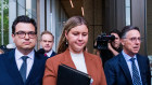 Brittany Higgins outside the Federal Court in Sydney last November, with partner David Sharaz, left, and lawyer Leon Zwier.