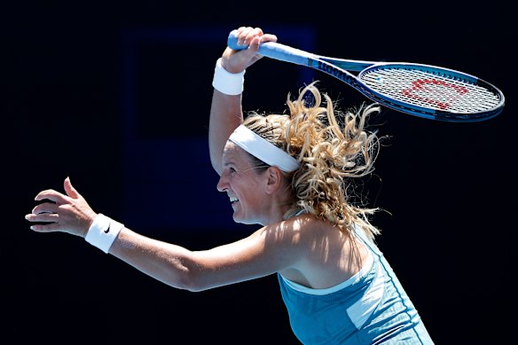 Victoria Azarenka returns a forehand in her first-round match.