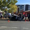 Person trapped after car flips in Dickson crash