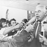 During Australia's constitutional crisis of 1975, Gough Whitlam addresses reporters outside the parliament building in Canberra after his dismissal.