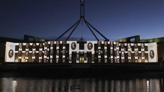 A light show is projected onto Parliament House