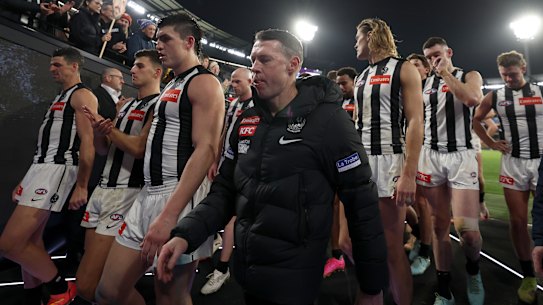 Craig McRae, Senior Coach of the Magpies looks dejected after losing to Hawthorn.
