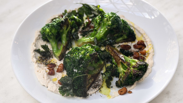 Charred broccoli with cashew paste and curry oil.