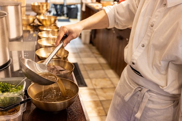 City restaurant Sagye’s gomtang is ladled into brass bowls.