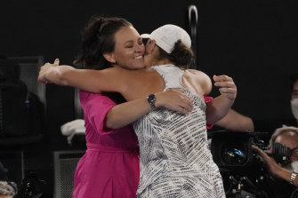 Barty hugs former player Casey Dellacqua as she celebrates her win.