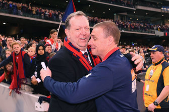 Glen Bartlett and coach Simon Goodwin embrace after a Demon win.