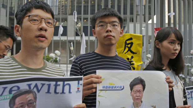 Pro-democracy activists, from right, Agnes Chow, Joshua Wong and Nathan Law.