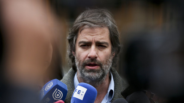 Abuse victim Jose Andres Murillo talks to reporters about the defrocking of priest Fernando Karadima by Pope Francis, in Santiago, Chile, on Friday.