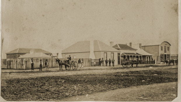 Portland’s main street 25 years after the European settlement was founded.  A bullock team can be seen far right.