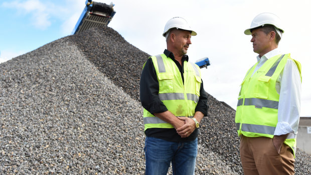 Opposition Leader Bill Shorten visits a recycling facility in Melbourne yesterday. Mr Shorten has announced Labor's commitment to tackling plastic use and boosting recycling. 