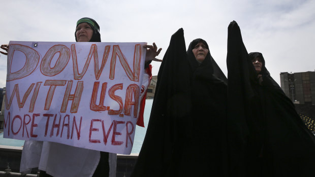 Iranian women attend an anti-US gathering after the Friday prayer in Tehran.