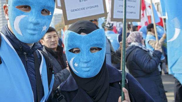 Uyghurs people demonstrate against China on the place des Nations in front of the European headquarters of the United Nations, in Geneva.