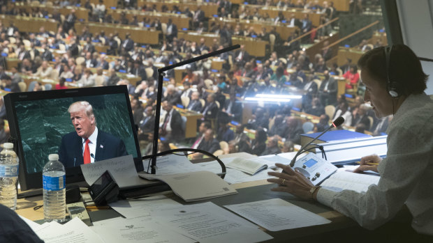 President Donald Trump is seen on a translators video screen as he addresses the 73rd session of the United Nations General Assembly.