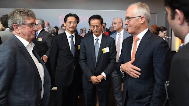 (Centre three from left to right) H.E. Consul General Gu Xiaojie, H.E. Jingye Cheng Chinese Ambassador to Australia and Prime Minister Malcolm Turnbull.