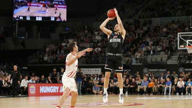 From a distance: Chris Goulding sends off a shot for Melbourne United.