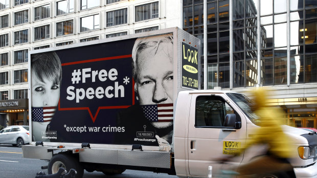 A Free Speech poster vehicle with images of Chelsea Manning and WikiLeaks founder Julian Assange in Washington last week.