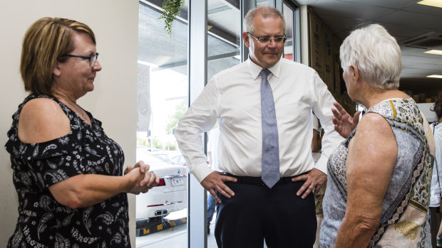 Prime Minister Scott Morrison meets voters Gayle Price-Davies and Gwyneth Hockey in Brisbane.
