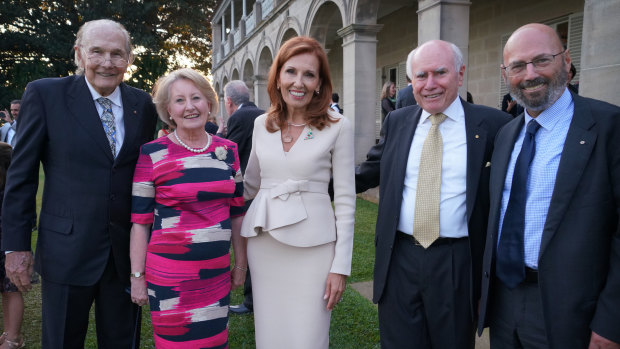 Helen Zorbas, centre, with (from left) husband David Gillett, Janette and John Howard and Arthur Sinodinos.  