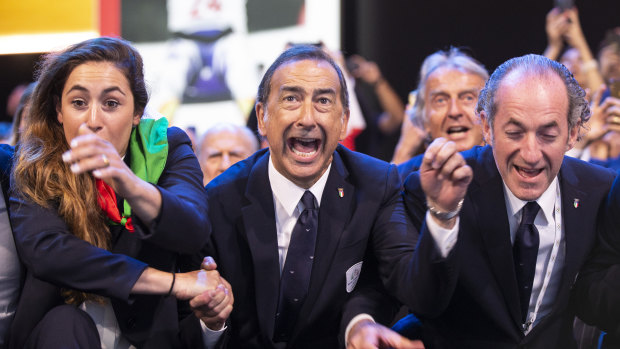 Veni vidi vici: The Mayor of Milan, Giuseppe Sala, center, and members of Milan-Cortina delegation celebrate after winning the bid to host the 2026 Winter Olympic Games.