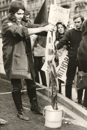 A protester with an American flag, City Square, Melbourne. 