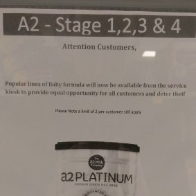 The sign explains the removal was "to provide equal opportunity" to shoppers.