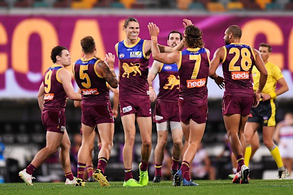 Brisbane's Eric Hipwood celebrates a goal with teammates. 