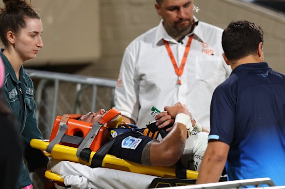 Noah Lolesio of the Brumbies is stretchered from the field.